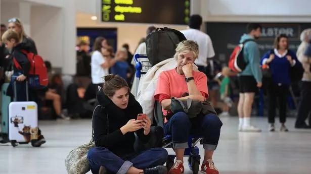 File photo dated 28/2/2023 of passengers at Belfast International Airport, as flights to the UK and Ireland have been cancelled as a result of air traffic control issues in the UK. Airline passengers will benefit from tougher enforcement of consumer protection laws following an inquiry into the August 2023 air traffic control (ATC) meltdown, Transport Secretary Louise Haigh has said. More than 700,000 passengers suffered disruption when flights were grounded at UK airports on August 28 last year after ATC provider National Air Traffic Services (Nats) suffered a technical glitch while processing a flight plan. Issue date: Thursday November 14, 2024.