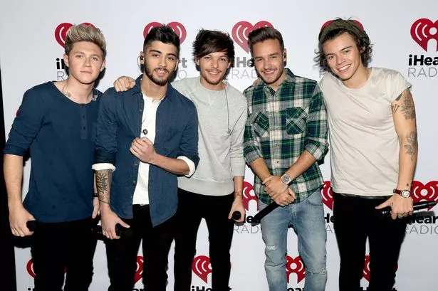 Niall Horan, Zayn Malik, Louis Tomlinson, Liam Payne, and Harry Styles of the band One Direction