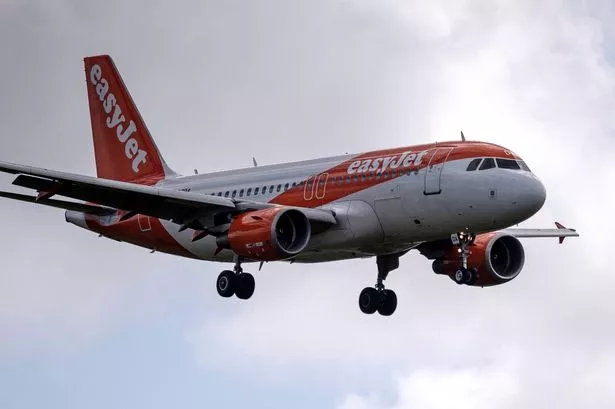 An Easyjet passenger plane comes in to land