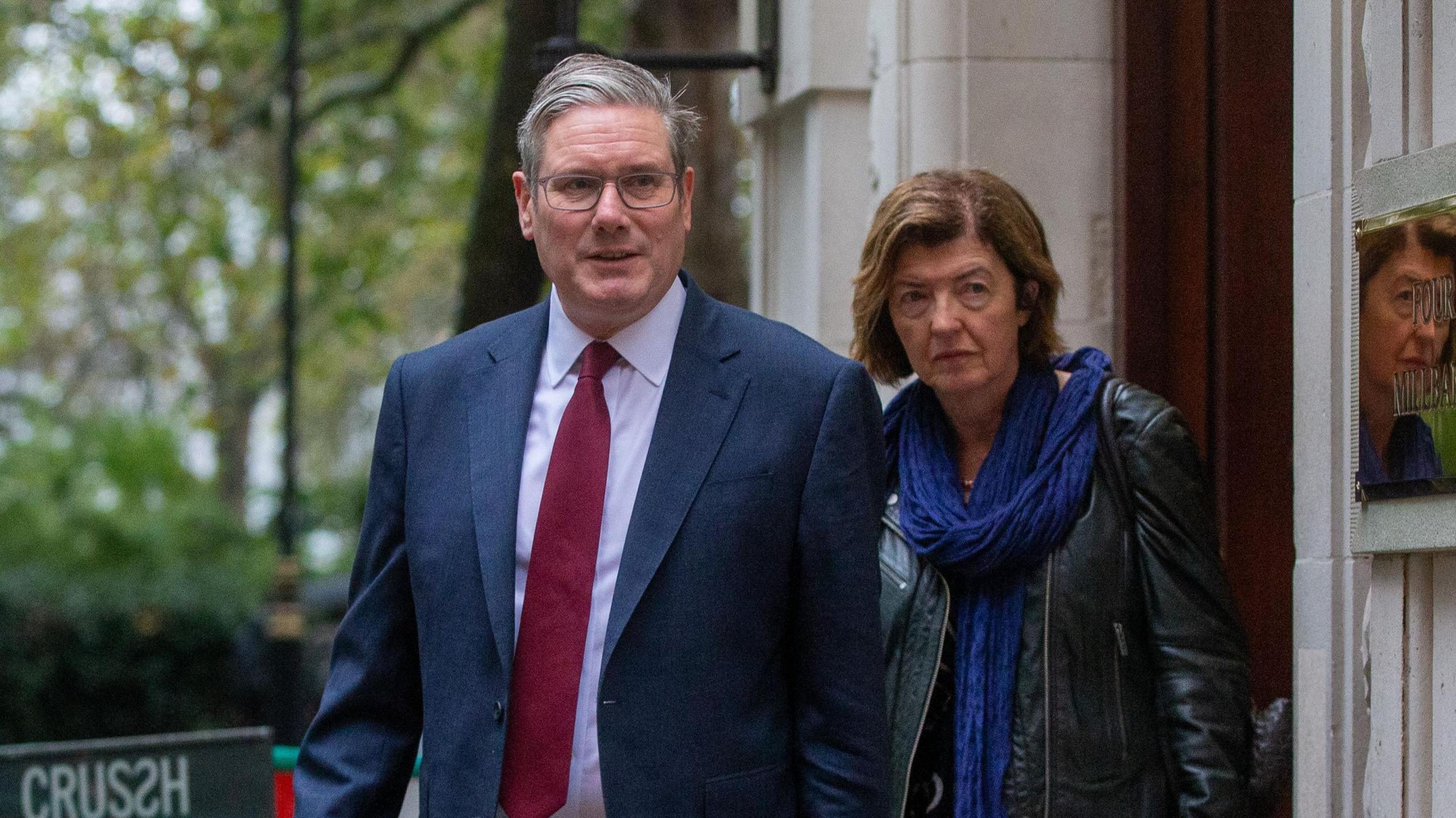 Sir Keir Starmer and Sue Gray leaving a building in Westminster