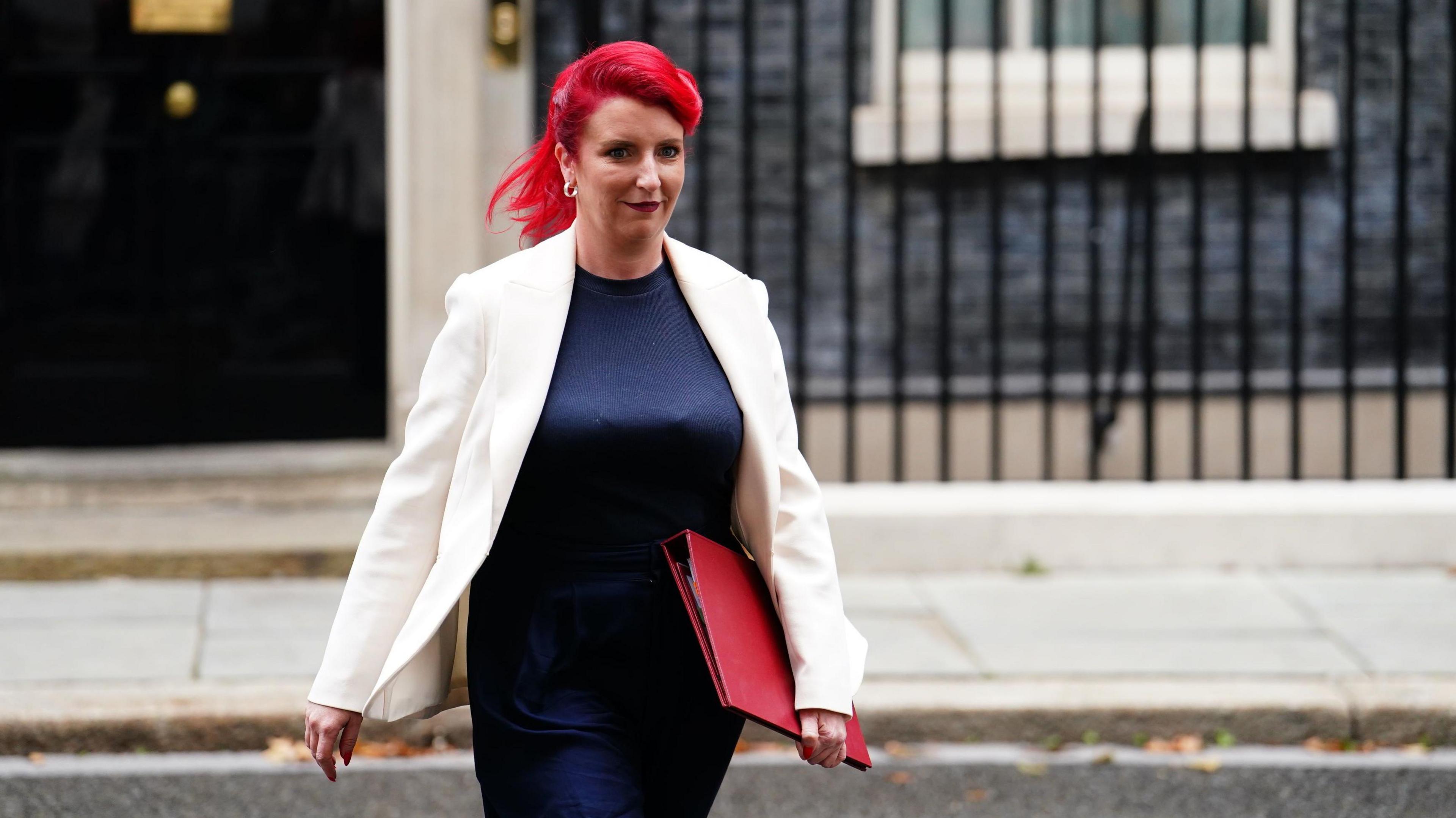 Louise Haigh leaving Downing Street carrying a red folder