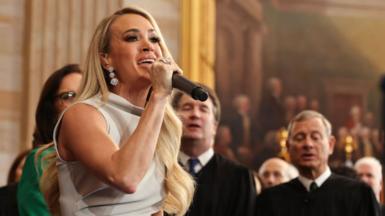 Carrie Underwood singing at the inauguration with the crowd behind her