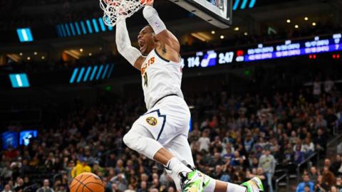 Russell Westbrook dunks during the second half of an NBA game against the Utah Jazz 