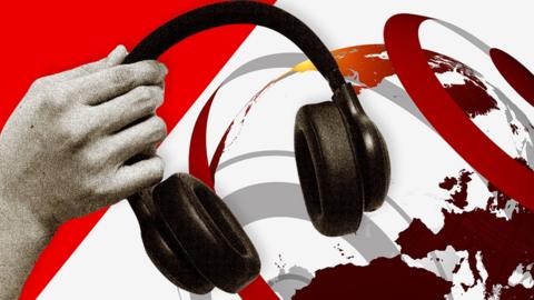 A pair of black over-the-ear headphones against a background of a BBC News graphic