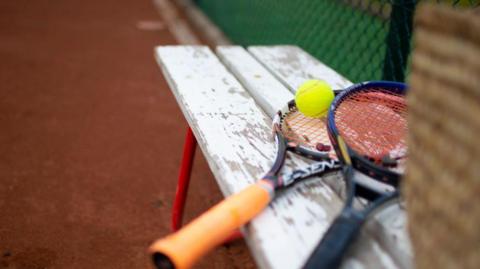 Generic picture of tennis racquets and a ball