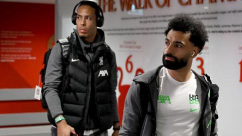 Virgil Van Dijk and Mo Salah arrive at Anfield