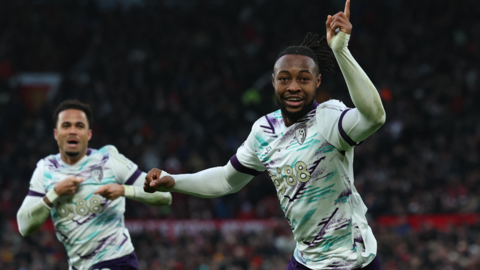 Bournemouth's players celebrate scoring against Manchester United.