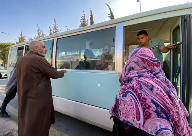 Jordanians, who left Gaza via the Rafah crossing into Egypt, seen arriving at the Marka Military Airport in Amman earlier today