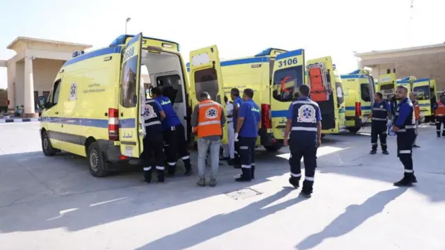 Egyptian ambulances transfer critically injured Palestinians at the Rafah crossing