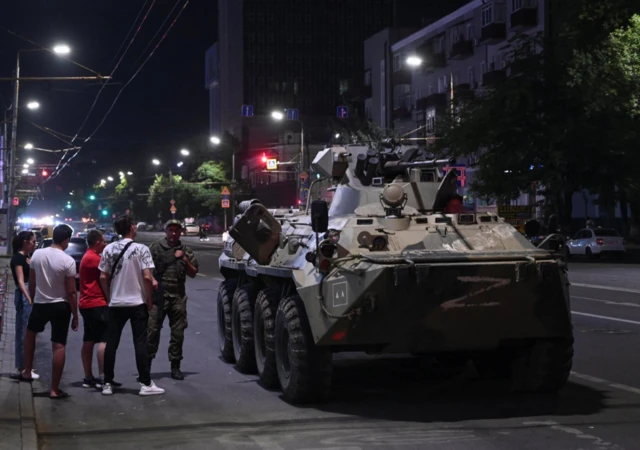 An armoured personnel carrier is seen on a street of the southern city of Rostov-on-DoN