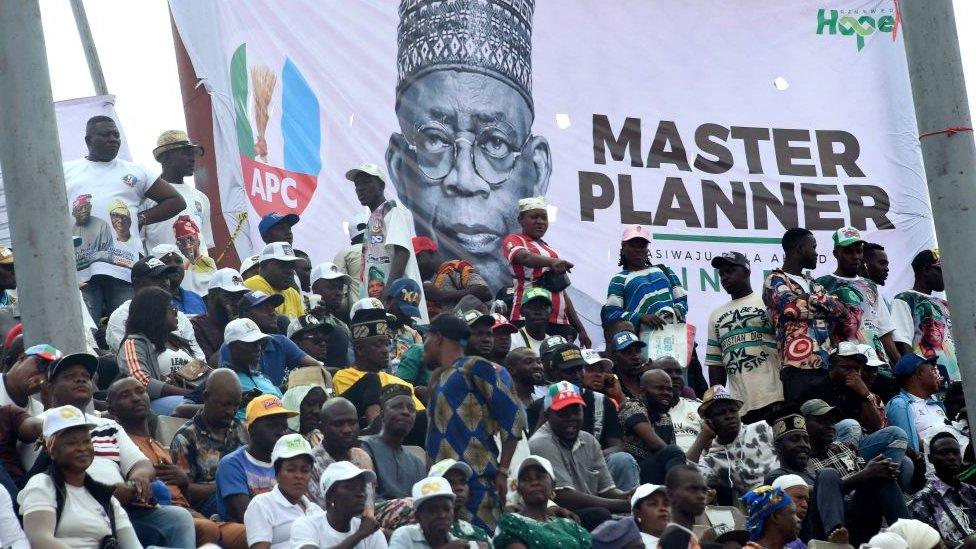 Bola Tinubu poster and rally