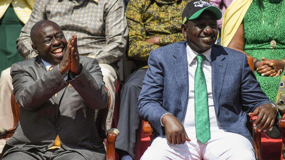 Kenya's Deputy President, William Ruto (R) sits next to his running mate Rigathi Gachagua, at the Deputy's official residence in Karen, Nairobi, on May 15, 2022