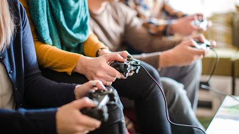 Getty Images To help reform bad behaviour online, one gaming company has introduced a feature in which other players punish negative play (Credit: Getty Images)