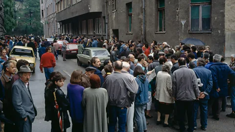 Getty Images Queuing for the meagre rations brought into Sarajevo by humanitarian aid agencies and the UN often meant risking being out in the open during bombardments (Credit: Getty Images)