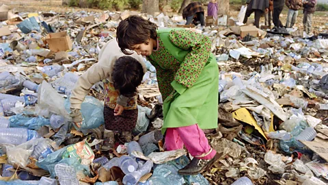 Getty Images Some people in Sarajevo were so dependent upon the UN for food during the seige that they were forced to scavange in its rubbish for morsels to eat (Credit: Getty Images)