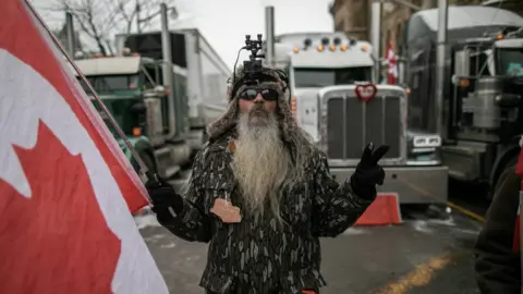 Getty Images A member of the 'Freedom Convoy' protesting in Ottawa