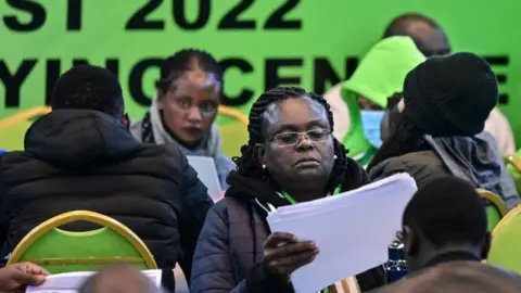 Getty Images Independent Electoral and Boundaries Commission (IEBC) clerks work to verify presidential results of the just concluded general election in the national tallying centre