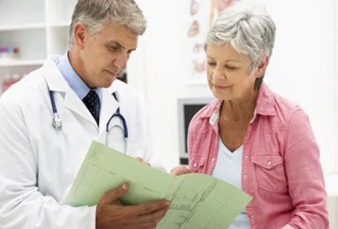 A doctor reviewing fibromyalgia treatments with a patient