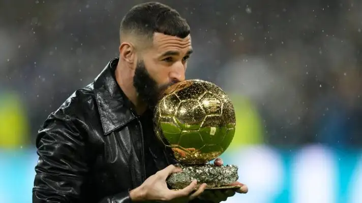 Karim Benzema with the Ballon d'Or trophy