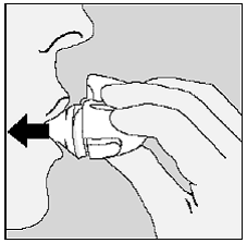 Remove any SPIRIVA capsule pieces or SPIRIVA powder buildup by turning your HANDIHALER device upside down and gently, but firmly, tapping it - Illustration