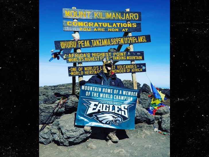 Eagles' Chris Long Rocks Dog Mask on Peak of Mount :: 0226-eagles-flag-mount-kilimanjaro-summit-sign-instagram-2