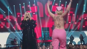 Avril Lavigne Confronts Topless Streaker on Stage at Juno Awards