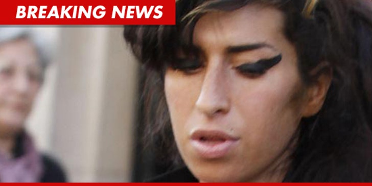 Winehouse's Dad Someone Has STOLEN Amy's Music :: 0811-amywinehouse-getty-bn