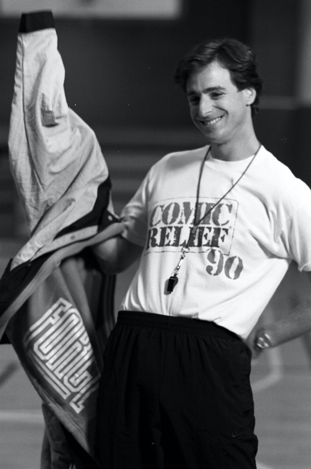 1990: Bob Saget during Comic Relief Shoot at Loyola Marymount University in Los Angeles, CA, United States.