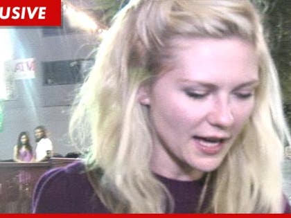 1209_kirsten_dunst_tmz3_EX