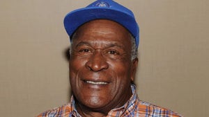 John Amos Smiling With A Blue Hat On