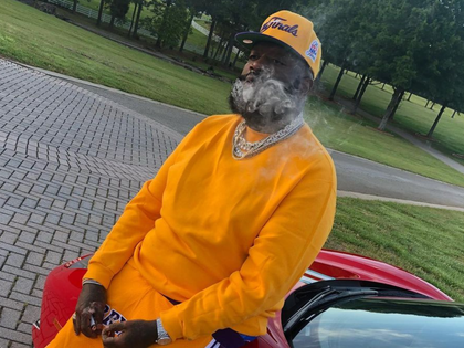 Rick Ross Smoking photos 4