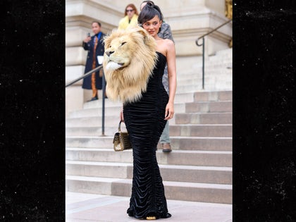 Kylie Jenner wears lions head at Haute Couture Fashion Show