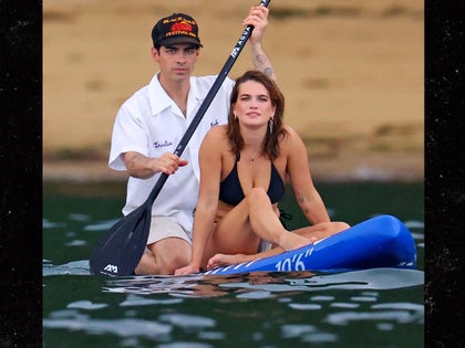 Joe Jonas And Stormi Bree On a Yacht And Paddleboard