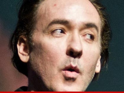 0904_john_cusack_stalker_article_Getty