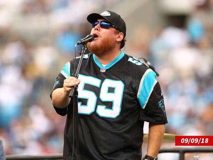 luke combs singing panthers gear