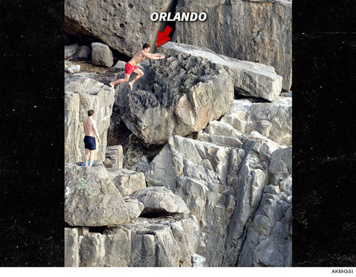 Orlando Bloom Leaves a New Cliff-hanger By Cliff Jumping PHOTO :: 0322-orlando-bloom-akm-arrow-4