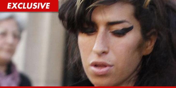 Amy Winehouse's Family Never Mentioned Prescription Rx :: 0811-amywinehouse-getty-ex