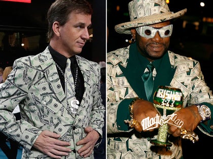 0201-cooper-manning-don-magic-juan-money-photos