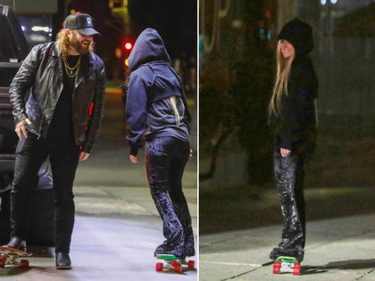 Avril Lavigne And Nate Smith Riding Skateboards