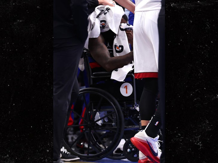 Tim Hardaway Jr Leaving The Game In a Wheelchair After Hitting His Head