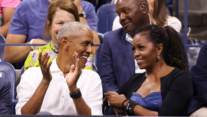 Barack and Michelle Obama watching Novak Djokovic at U.S. Open