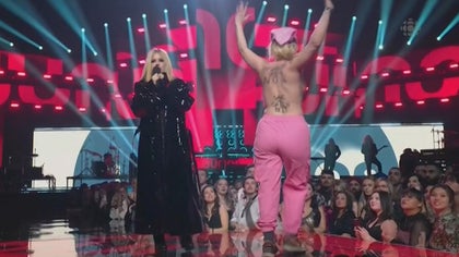 Avril Lavigne Confronts Topless Streaker on Stage at Juno Awards