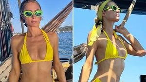 0801-paris-hilton-yellow-bikini-primary_720-2