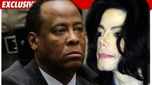 0624_conrad_murray_mj_ex