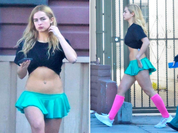 Addison Rae Shows Off Belly Button Piercing in Tiny Crop Top, Skirt