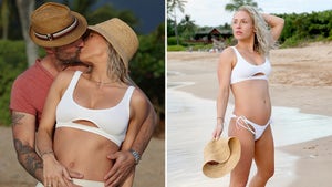 0204-Brian-Austin-Green-Sharna-Burgess-pregnant-baby-bump-beach-bikini-photos-primary