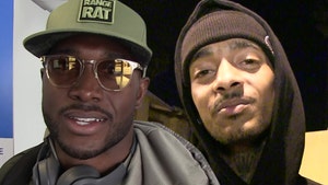 0412-reggie-bush-nipsey-hussle-tmz