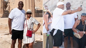 0708-magic-johnson-cookie-ll-cool-j-greece-vacation-photos-primary