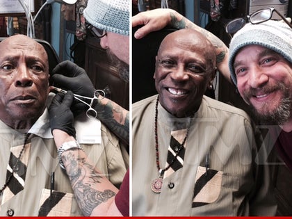 0804-louis-gosset-jr-ear-peirced-TMZ-01