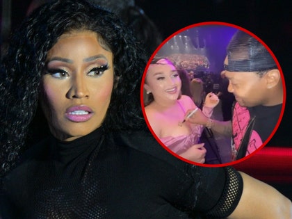 nicki minaj  DJ Boof signing the woman's chest